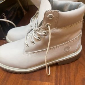 Off-white color timberland boot.